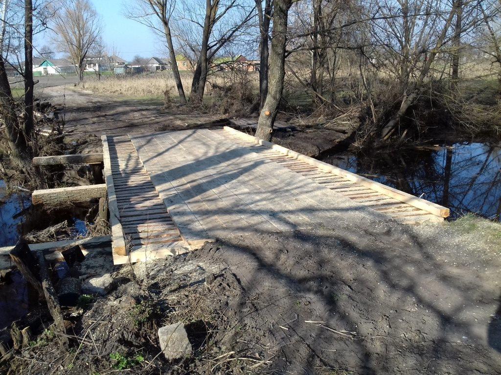 На Полтавщине восстановили мостки, которые снесло наводнение (фото)