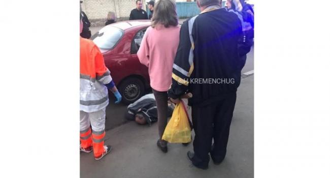 В Кременчуге возле автомобиля лежал труп (фото)