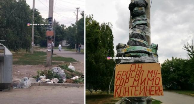 В Кременчуге на столб повесили "труп" человека, который мусорил (фото)
